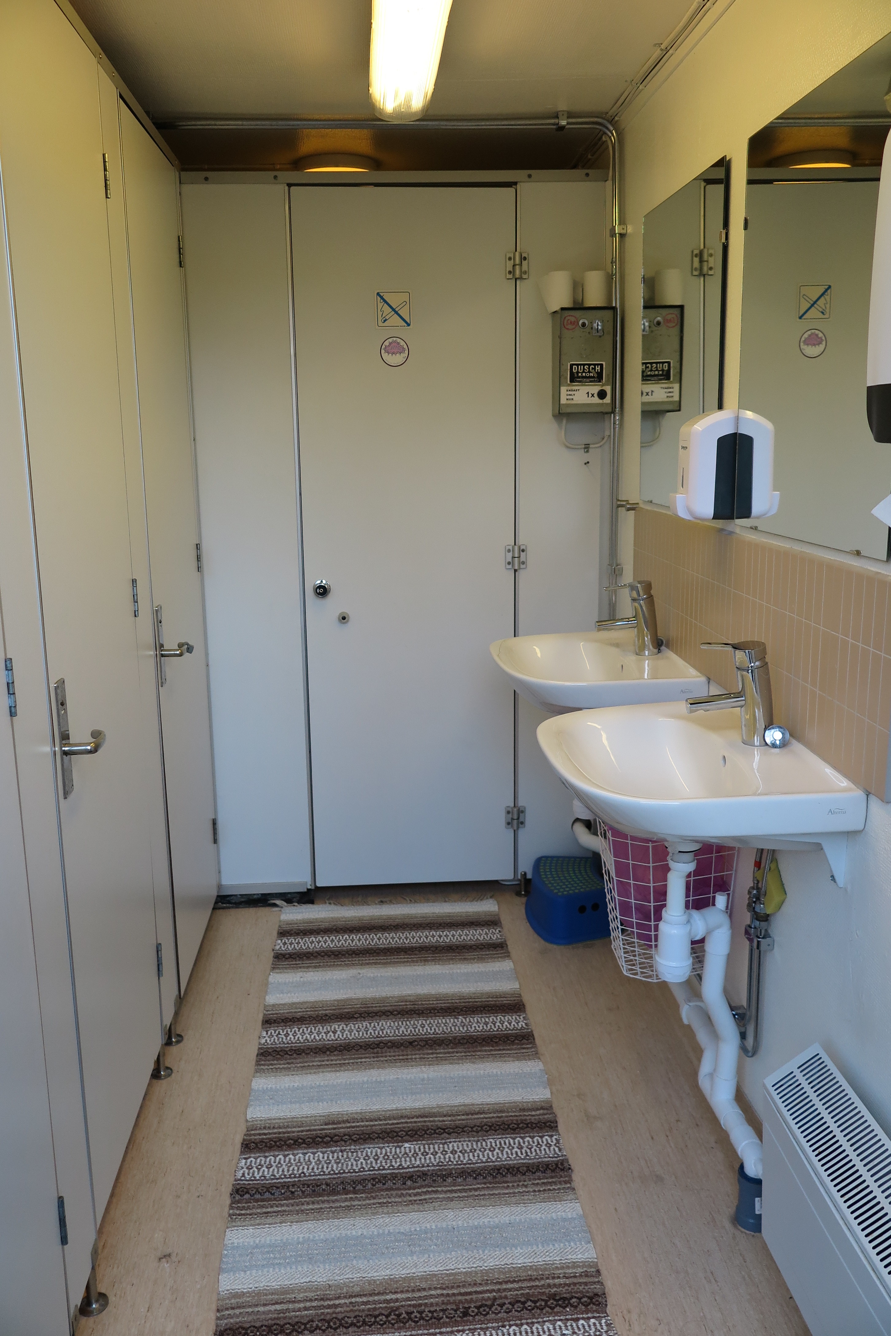 The ladies room with shower and laundry